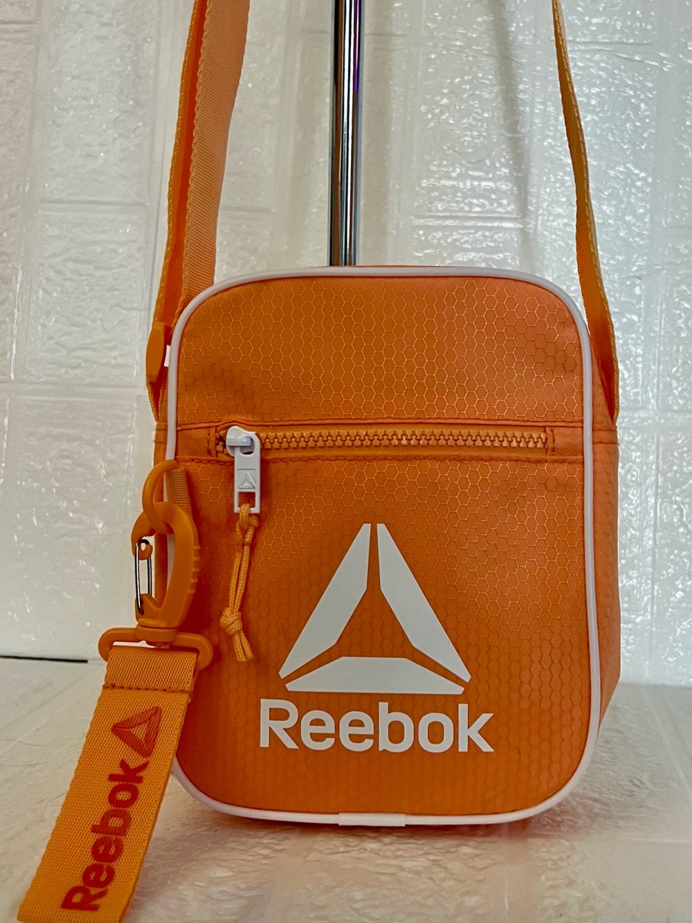 Reebok | Orange Logo Crossbody Bag with Adjustable Strap